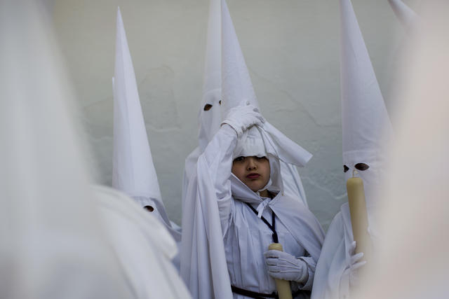 What Does the Official Uniform of the KKK Have to Do With Medieval Easter  Penitents? - U.S. News 