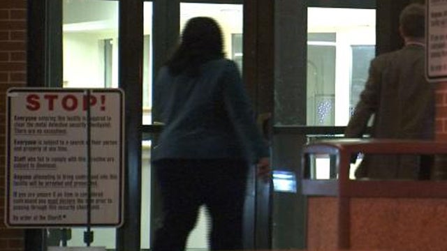 Tameka Goodson, educator indicted in Atlanta school cheating scandal, surrendering at Fulton County Jail early on April 2, 2013, the deadline set by prosecutors for all defendants in the scandal to do same  