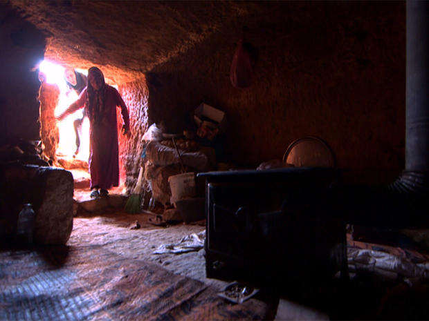 CBS News correspondent Clarissa Ward follows a Syrian woman into her adopted underground home 