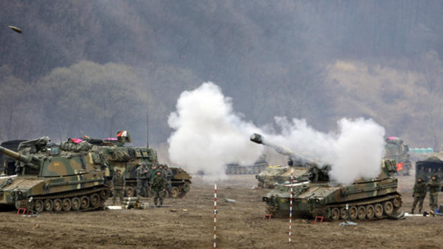 South Korean marine's K-55 self-propelled howitzer fires during a military exercise in the border city between two Koreas, Paju, north of Seoul, South Korea, Tuesday, April 2, 2013. 