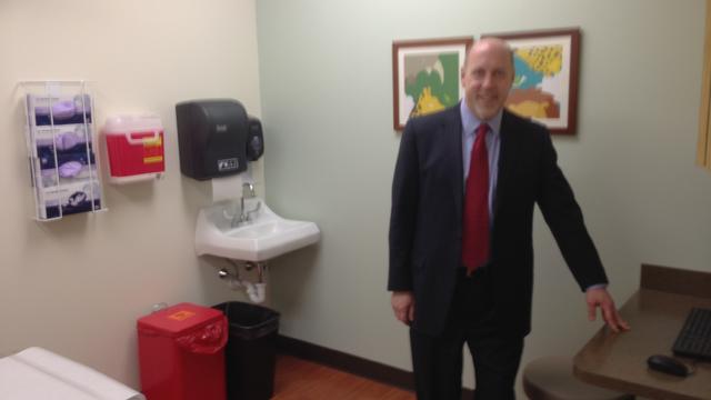 dr-mankin-stands-in-a-patient-exam-room-at-temples-new-readycare-facility-in-the-pavillion-at-jenkintown.jpg 