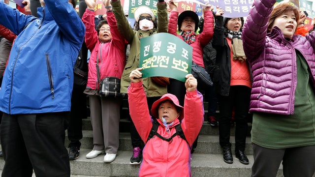 South Korean protesters from Korea Freedom Federation shout slogans in Seoul, South Korea, April 11, 2013, during a rally denouncing North Korea's decision to pull workers from the Kaesong industrial park as well as its threat of nuclear war and its alleg 