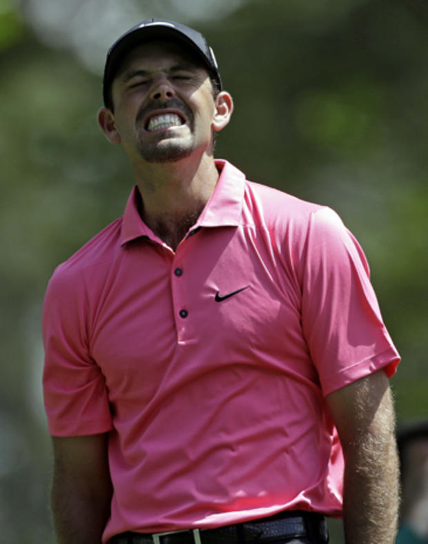 Charl Schwartzel, of South Africa, reacts after his tee shot on the fourth hole during the second round of the Masters golf tournament April 12, 2013, in Augusta, Ga. 