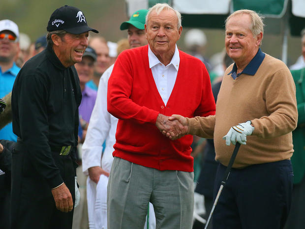 Three of golf's greatest players, Gary Player, left, Arnold Palmer, center, and Jack Nicklaus, smile after their ceremonial tee shots at the Masters golf tournament in Augusta, Ga., April 11, 2013. 
