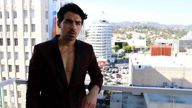 Joe Jonas' sexy sax response to fan's video 