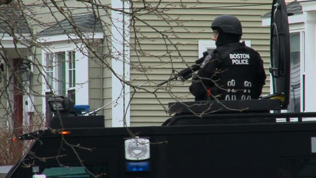 Armored trucks, SWAT overtake Watertown neighborhood, WBZ reporter says 