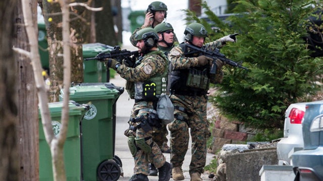 SWAT teams searched homes along Winsor Avenue in Watertown while searching for one of the two suspects in the terrorist bombing of the 117th Boston Marathon earlier this week 
