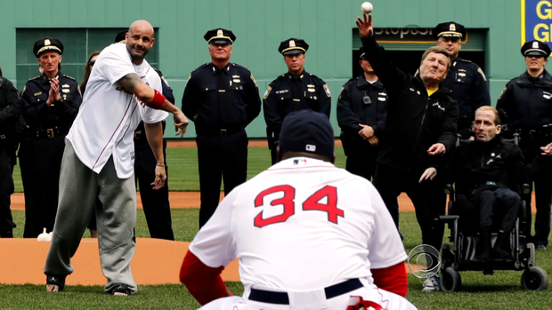 Steve Byrnes throws the opening pitch at Fenway Park. 