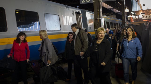 TORONTO, CANADA - APRIL 22: Commuters leave a VIA Rail train at Union Station, the heart of VIA Rail travel, on April 22, 2013 in Toronto, Ontario, Canada. The Royal Canadian Mounted Police (RCMP) report they have arrested two people connected to an alleg 