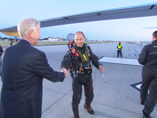 Retired pilot Sully Sullenberger gets a closer look at Solar Impulse. 