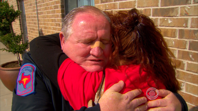 Dr. George Smith hugs a fellow Texan grieving over the loss of 14 first responders in West. 