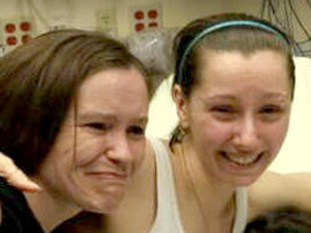 Amanda Berry, right, with her sister in a Cleveland hospital Monday, May 6, 2013. 