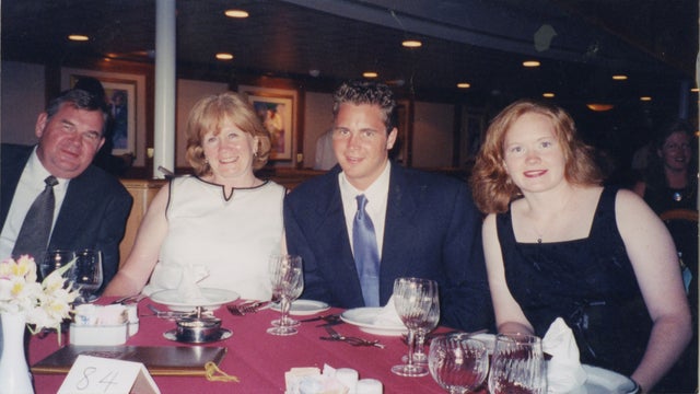 George Smith was very close to his family. Here he is pictured with his parents and sister. 
