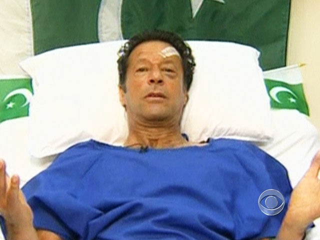 Imran Khan greeted his supporters at his final political rally Thursday from his hospital bed.