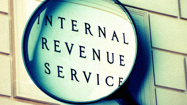 IRS sign with magnifying glass  