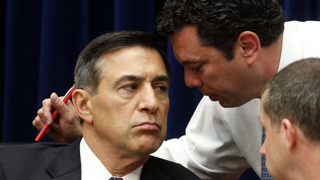 Rep. Darrell Issa, left, R-Calif. and chairman of the House Oversight and Government Reform Committee, talks with Rep. Jason Chaffetz, R-Utah, during a hearing on Capitol Hill in Washington May 8, 2013. 