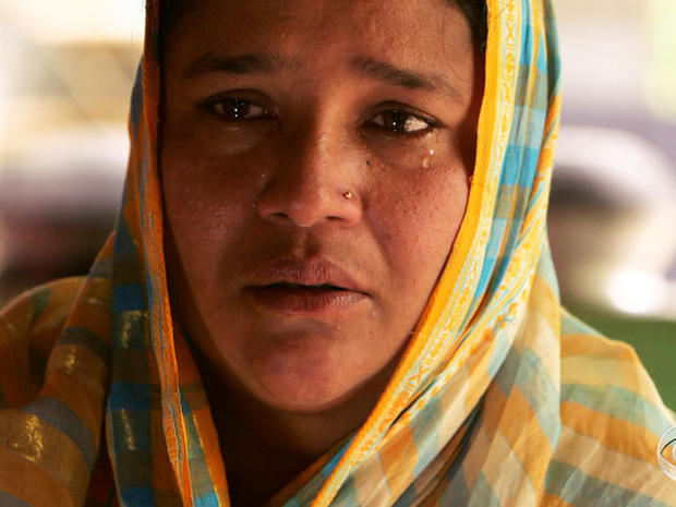 Hosne Ara Fahima believes factory owners paid for her her labor activist husband to be killed. 