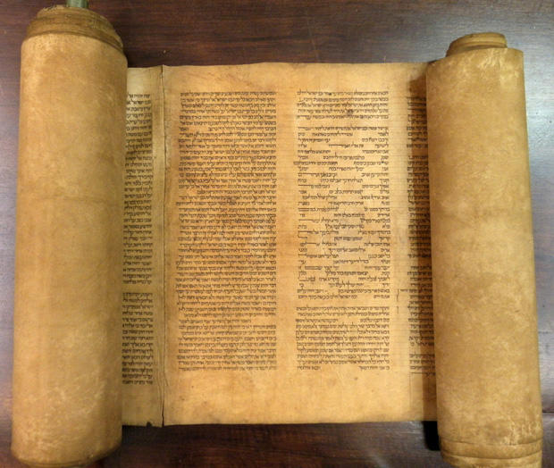In this undated photo provided by Alma mater Studiorum Universita' di Bologna, a document that an Italian expert says to be the oldest known complete Torah scroll. 