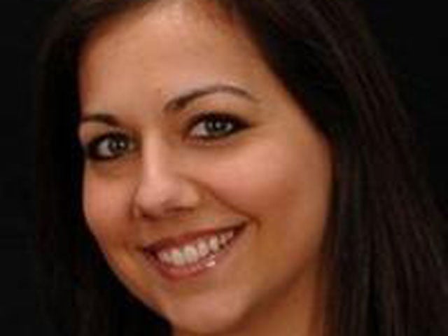 ExKansas cop accused of killing wife(01)