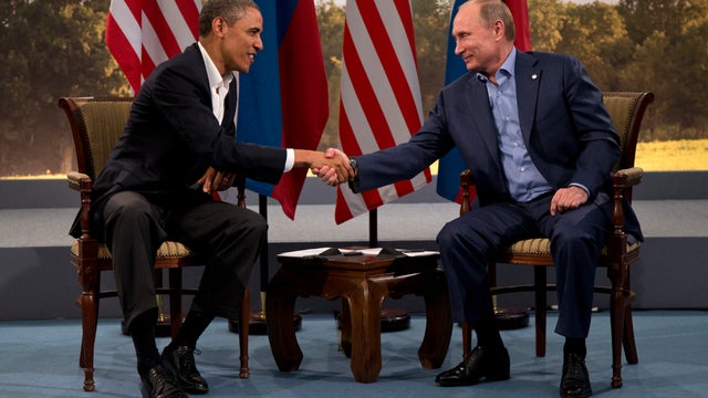 President Obama and Russian President Vladimir Putin shake hands during June 17, 2013 bilateral meeting at G-8 Summit in Enniskillen, Northern Ireland 