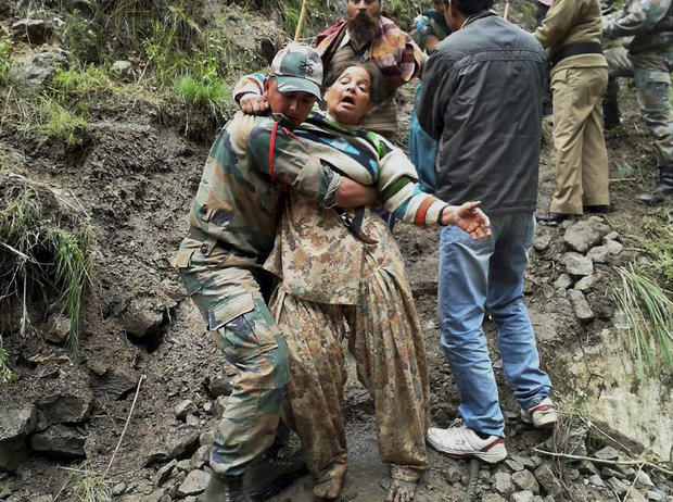       Editorial  India Floods Download Comp Search 4 of 4,359 India Floods      Overview  Rescuers help escort stranded pilgrims to helicopters to evacuate at Joshimath in the northern Indian state of Uttarakhand, India. 