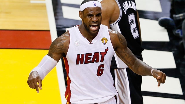 LeBron James of the Miami Heat reacts in the third quarter while taking on the San Antonio Spurs during Game Seven of the 2013 NBA Finals at American Airlines Arena on June 20, 2013 in Miami, Florida.  