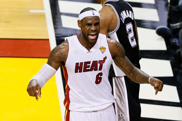 LeBron James of the Miami Heat reacts in the third quarter while taking on the San Antonio Spurs during Game Seven of the 2013 NBA Finals at American Airlines Arena on June 20, 2013 in Miami, Florida. 