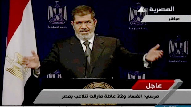 Egypt's President Mohammed Morsi addresses his country on Egyptian television July 2, 2013, amid widespread protests and an ultimatum recently given by the military. 
