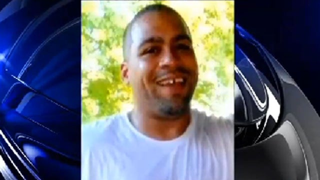 New England Patriots tight end Aaron Hernandez, left, stands with his attorney, Michael Fee, right, in Attleboro District Court June 26, 2013, in Attleboro, Mass. 