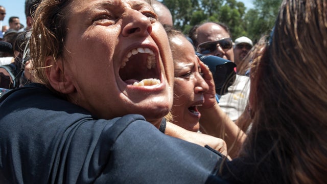 A Tunisian supporter of the Popular Front party reacts at Mahmoud Materi hospital after Mohammed Brahmi was shot to death in his car outside his home north of Tunis, Tunisia, July 25, 2013. 