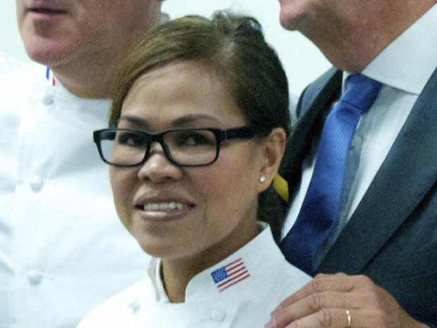 President Obama's executive chef, Cristeta Comerford, meets with members of the Club des Chefs des Chefs - chefs to the world's presidents and potentates - at United Nations headquarters in New York July 29, 2013. 