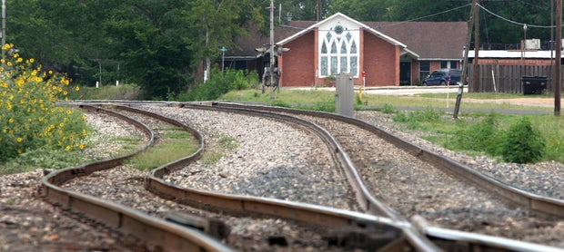 Railroad tracks wind their way through Weimar, Texas, past the Weimar United Church of Christ. The Church's beloved pastor and his wife were murdered in their home behind the church by Resendiz. Texas authorities determined they had a serial killer on their hands. 