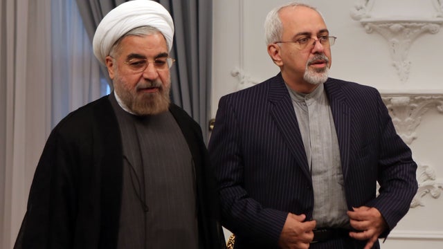 Iran's new President Hasan Rouhani (Left) stands next to Iran's former Ambassador to the UN, Mohammad Javad Zarif 