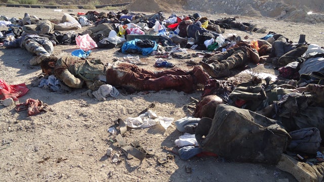 The bodies of rebel fighters are seen on the ground after an ambush by Syrian troops 
