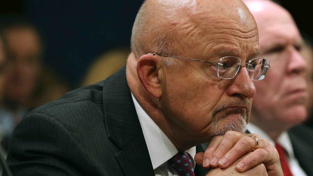 Director of National Intelligence James Clapper, in this file photo from earlier this year, previously claimed that NSA analysts cannot "eavesdrop on domestic communications without proper legal authorization" -- but never elaborated on what "proper legal 