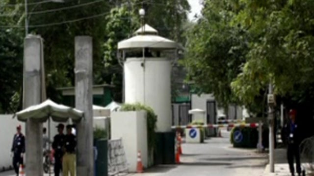 Security at gate of U.S. Consulate in Lahore, Pakistan's second-largest city, after all but emergency personnel were evacuated Aug. 8, 2103 due to what U.S. State Department called "specific" threat 