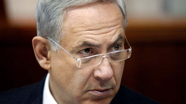 Israeli Prime Minister Benjamin Netanyahu listens during the weekly cabinet meeting in Jerusalem, Sunday, Aug. 4, 2013.  