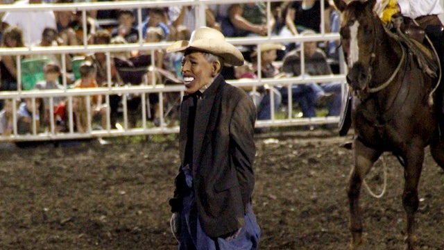 This photo provided by Jameson Hsieh shows a clown wearing a mask intended to look like President Obama at the Missouri State Fair. The announcer asked the crowd if anyone wanted to see &acirc; 