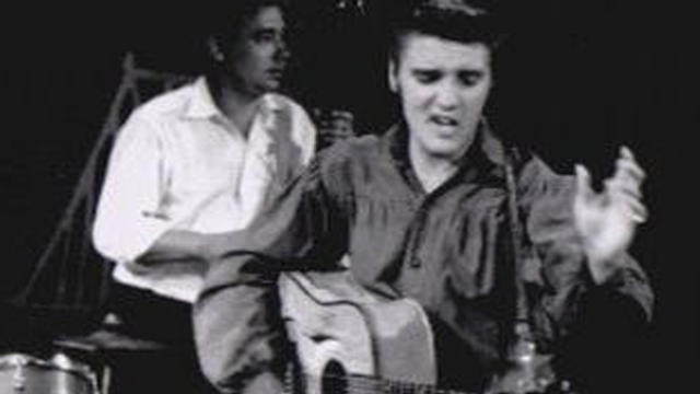 Elvis Presley performs on "The Ed Sullivan Show" on Sept. 9, 1956. 