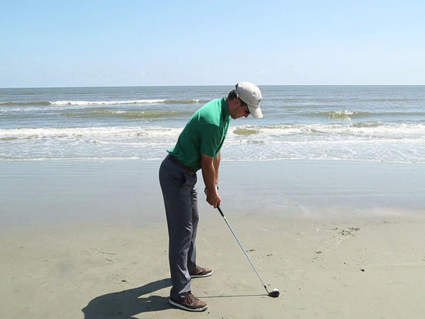 Luke Bielawski's last shot, with a biodegradable golf ball, sunk into the Atlantic. 