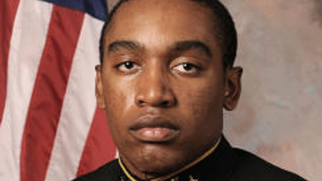 Graduates of the US Naval Academy sing the navy school song during the Naval Academy graduation ceremony at the Navy-Marine Corps Memorial Stadium on May 24, 2013 in Annapolis, Maryland. US President Barack Obama delivered the commencement address. 