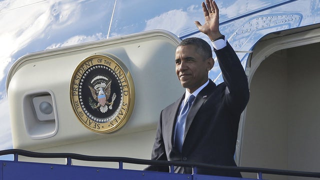 President Obama waves from Air Force One after arriving at Stockholm-Arlanda International Airport, Wednesday, Sept. 4, 2013 in Stockholm, Sweden 