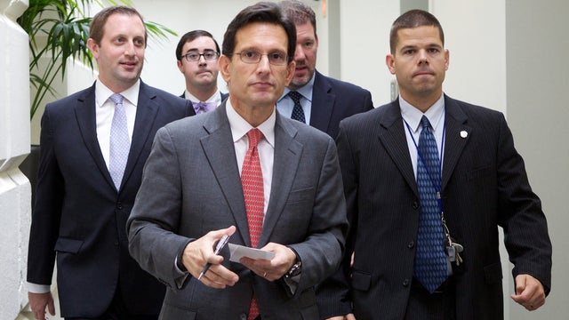 House Majority Leader Eric Cantor of Virginia walks out of a Republican caucus meeting at the U.S. Capitol in Washington Sept. 28, 2013. 