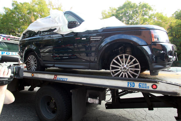 The Range Rover driven by Alexian Lien when he became involved in a confrontation in New York with several motorcyclists is moved to a police precinct, Saturday, Oct. 5, 2013. 