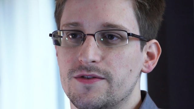 This June 9, 2013 file photo provided by The Guardian Newspaper in London, shows Edward Snowden, who worked as a contract employee at the National Security Agency, in Hong Kong. Reports of U.S. journalist Glenn Greenwald based on documents obtained by Sno 