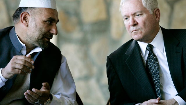 Robert Gates talks with then-Khowst Province Gov. Arsallah Jamal 