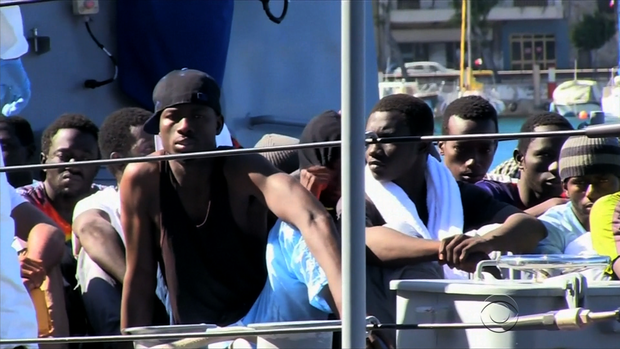 The U.S. Navy rescued 128 migrants who were crowded onto a rickety boat in the Mediterranean Sea. 