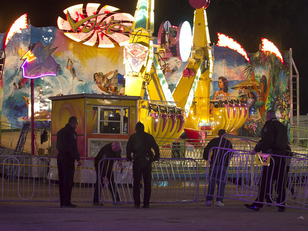 Fairgrounds Police secure a barricade around the Vortex after an accident closed the ride just after 9 p.m. on Thursday Oct. 24, 2013 at the N.C. State Fair in Raleigh, N.C. The accident occurred on the ride at the North Carolina State Fair on Thursday night, sending five people to the hospital; 2 were reported in critical condition 