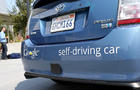 MOUNTAIN VIEW, CA - SEPTEMBER 25: A Google self-driving car is displayed at the Google headquarters on September 25, 2012 in Mountain View, California. California Gov. Jerry Brown signed State Senate Bill 1298 that allows driverless cars to operate on pub 