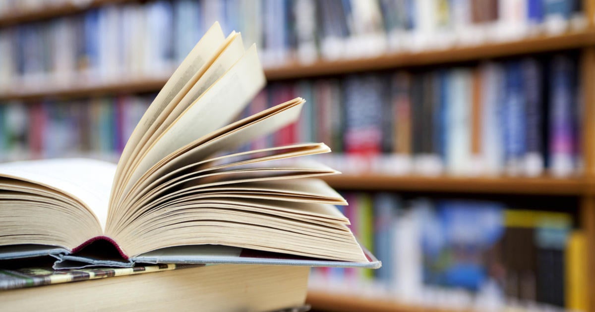 Communities cracking down on overdue books, with jail time - CBS News